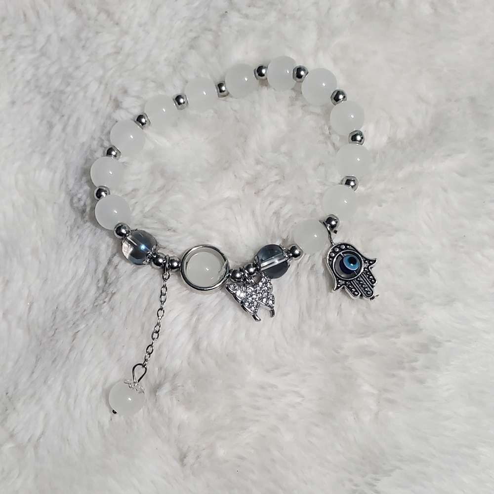Elegant White and Silver Beaded Bracelet with Charms